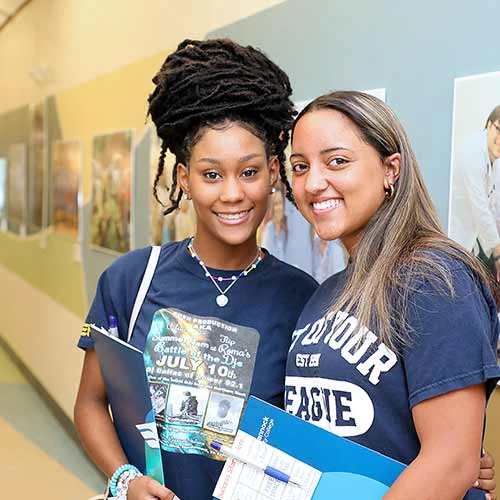 two girls in the hallway Warsaw campus